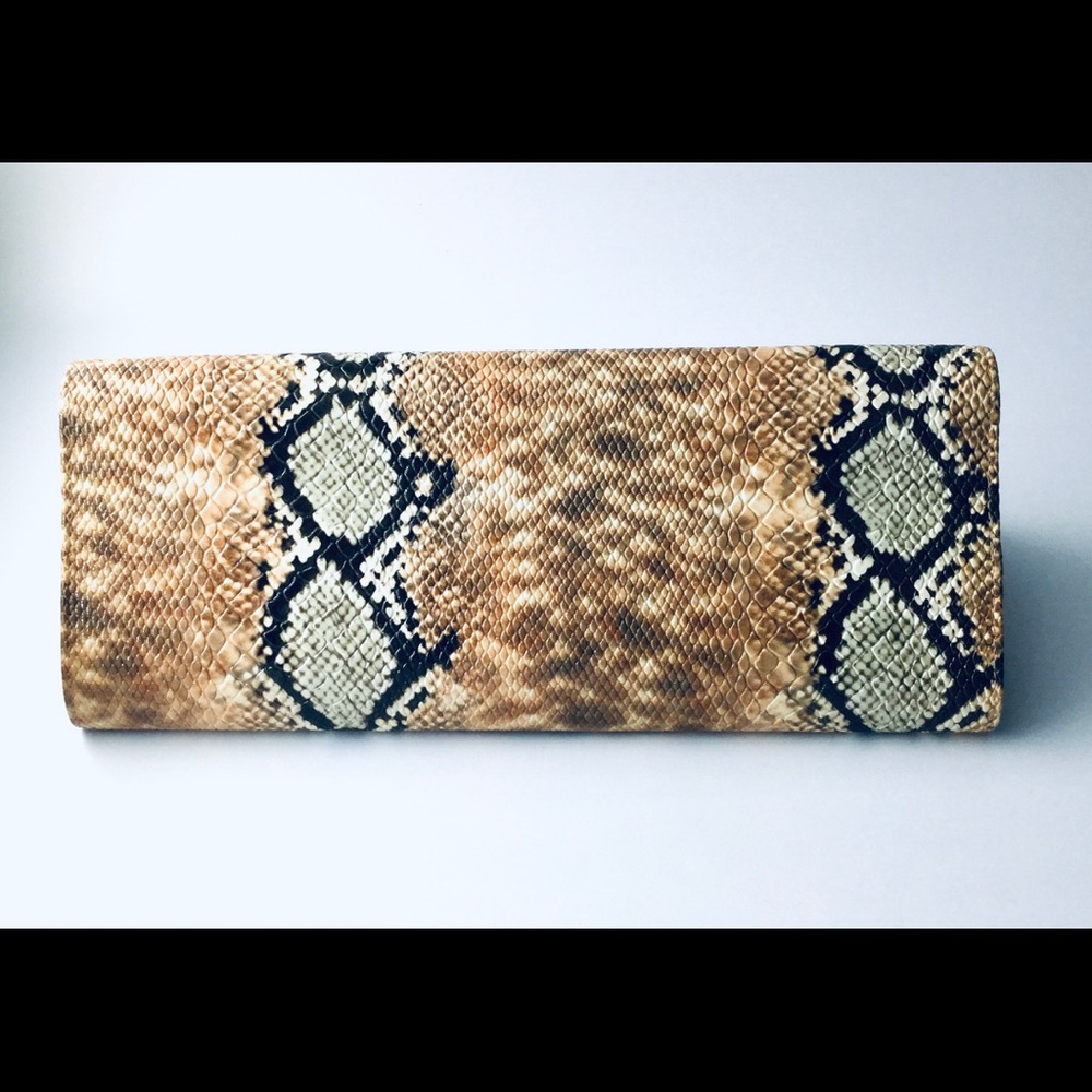 Beautiful multi colored Faux snakeskin clutch.